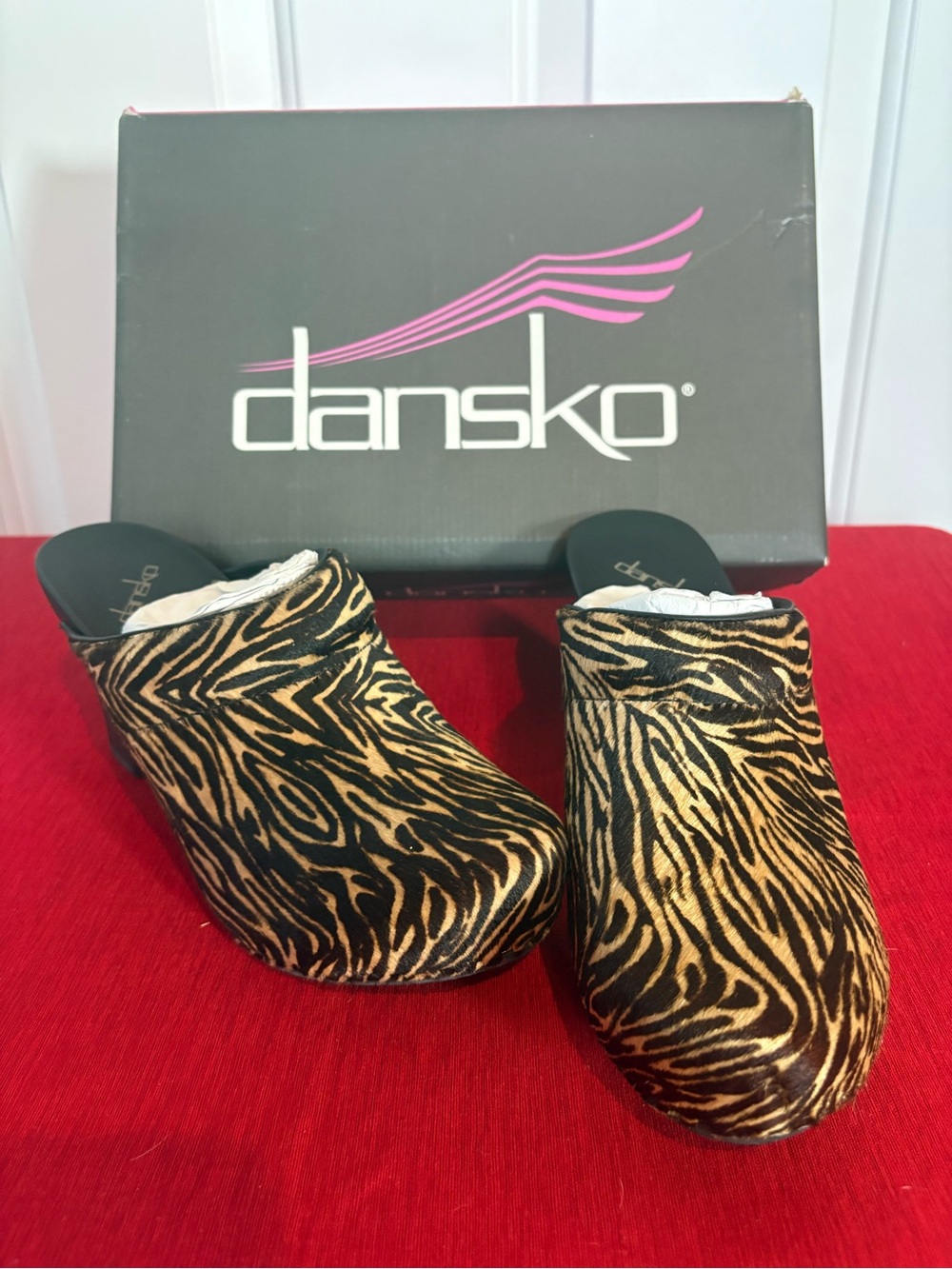 Dansko Rae Women’s Zebra-Print Clog in Black and Tan